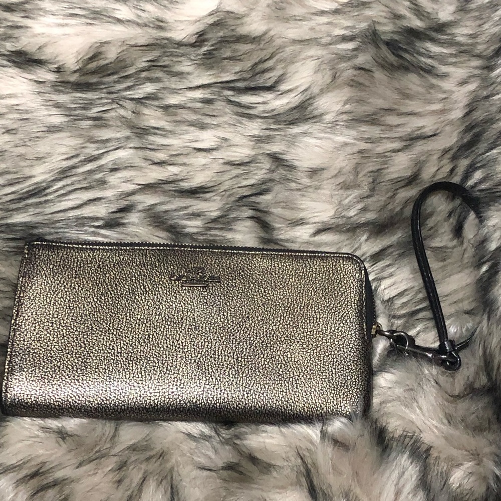 Metallic coach wristlet